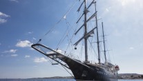 Sailing yacht RUNNING ON WAVES -  Bow